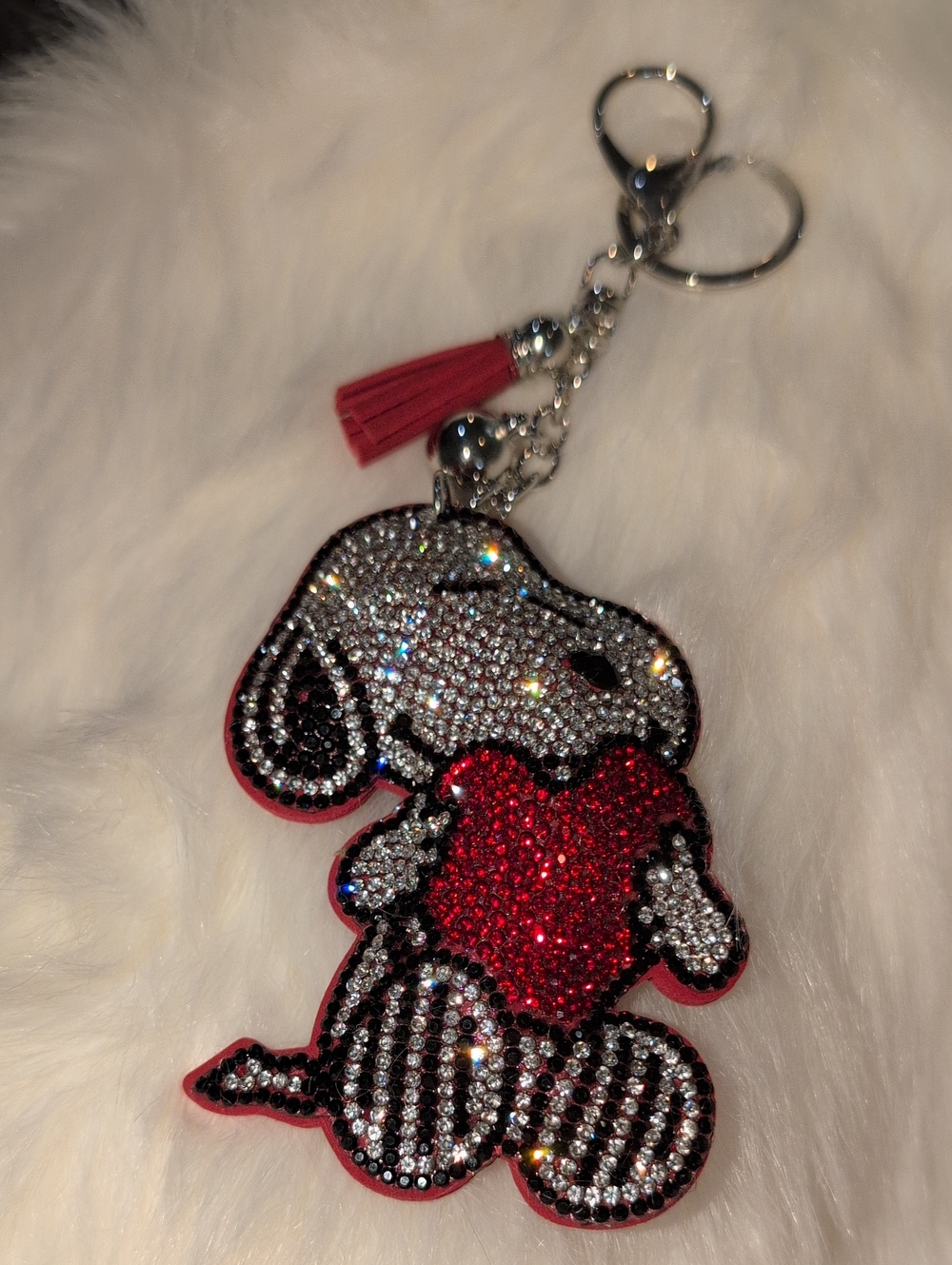 Snoopy Crystal Heart Keychain With A Red Tassel And Silver Hardware